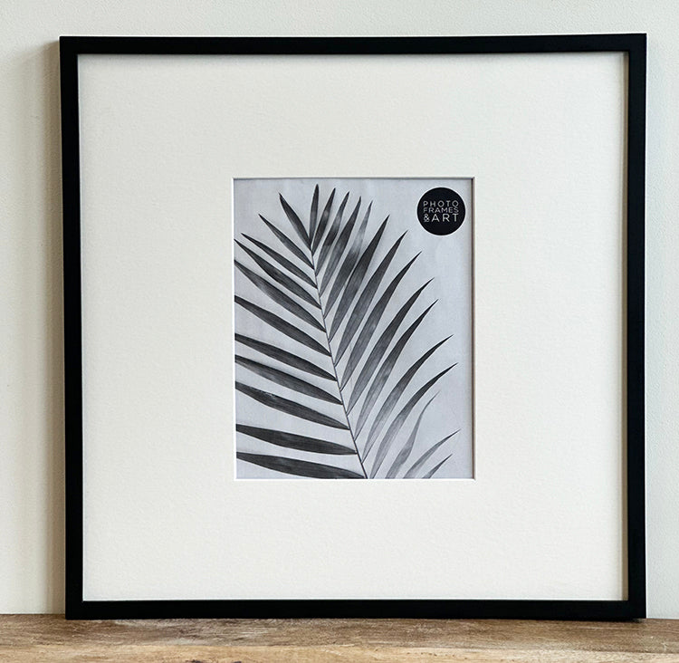 Oversized Mount Wooden 18x18 Black Frame for 10x8 with a Photo of a Plant and PF&A Logo