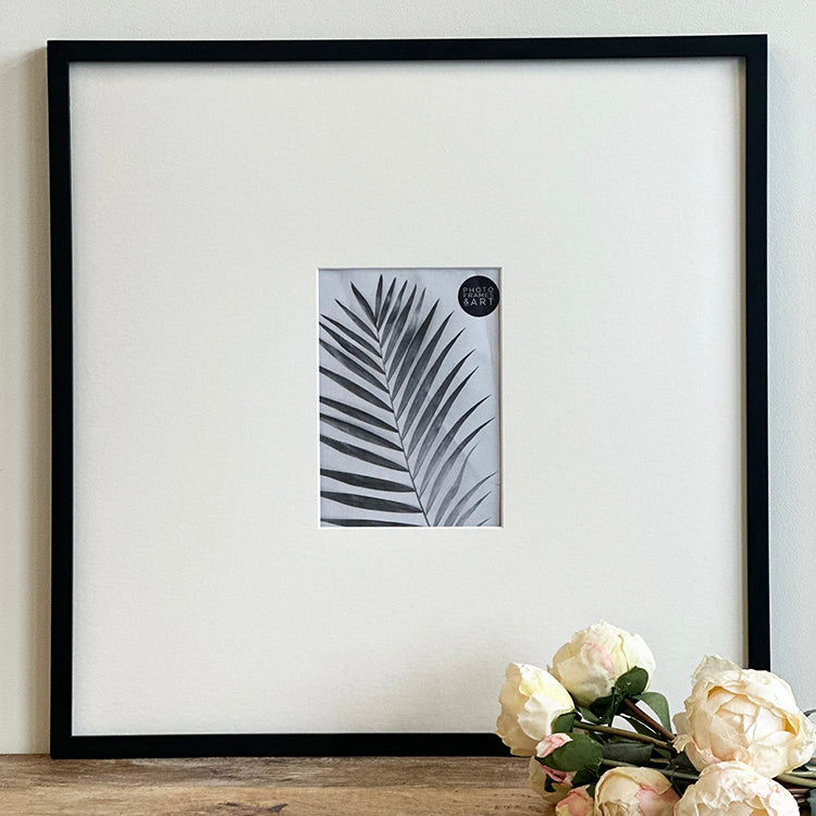 Oversized Mount Wooden 18x18 Black Frame for 6x4 with a Photo of a Plant and PF&A Logo