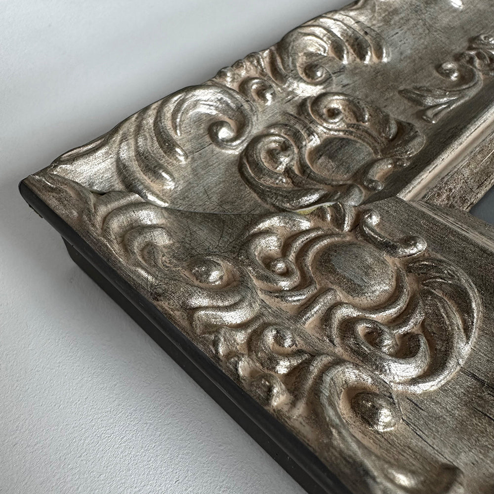 Corner of Silver Antique Photo Frame