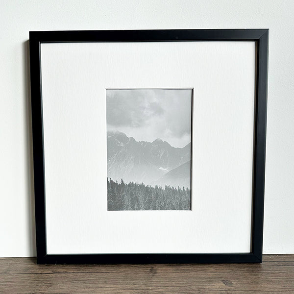 Oversized Mount Wooden 12x12 Black Frame for 7x5 with a scenic Photo of a mountain