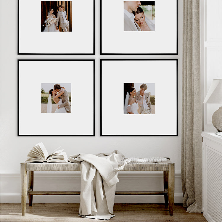 Mood Shot of Oversized Mount Wooden 24x24 Black Frame for 10x10 with Photos of a Couple on their Wedding Day